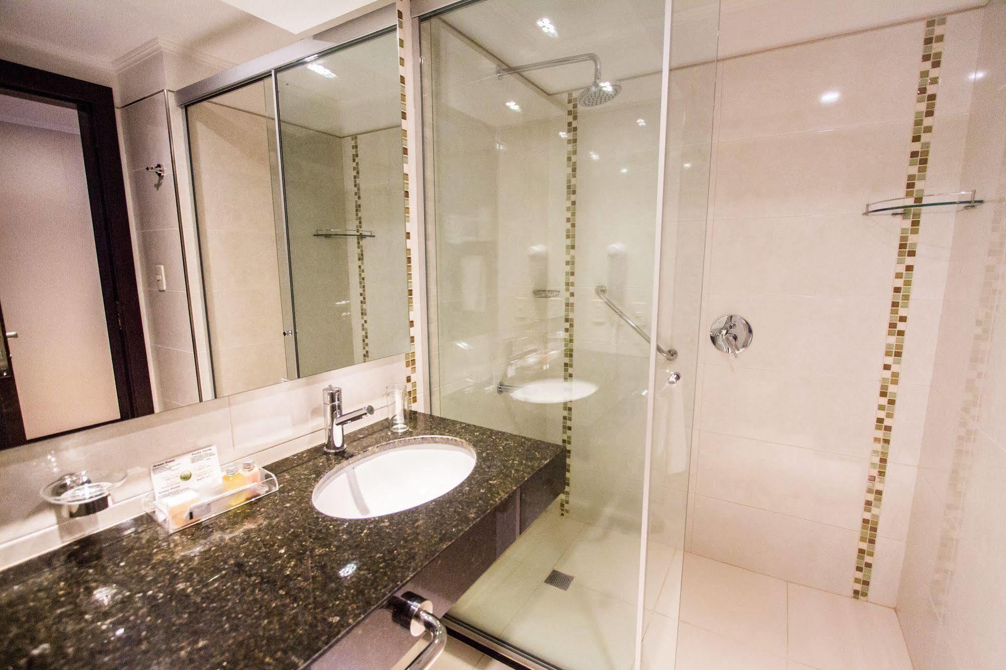 Carnaval Hotel Casino Encarnación Exteriör bild A shower cubicle